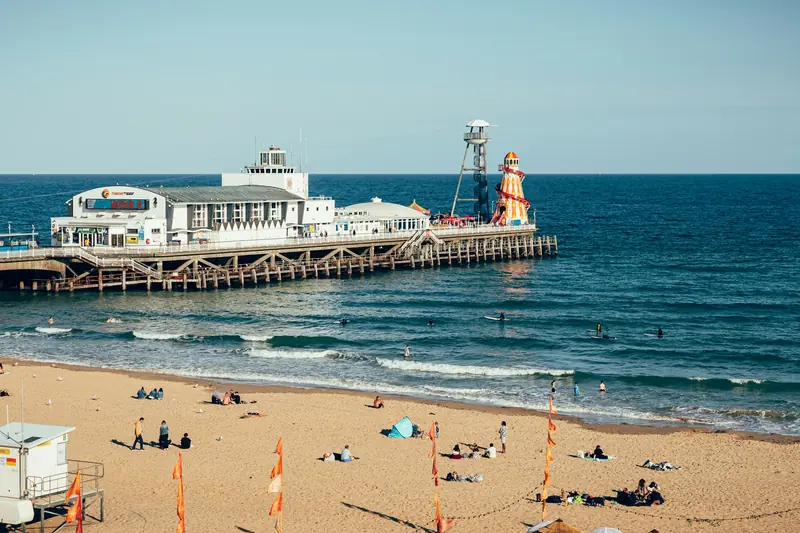 Bournemouth Pier and beach on a sunny day
