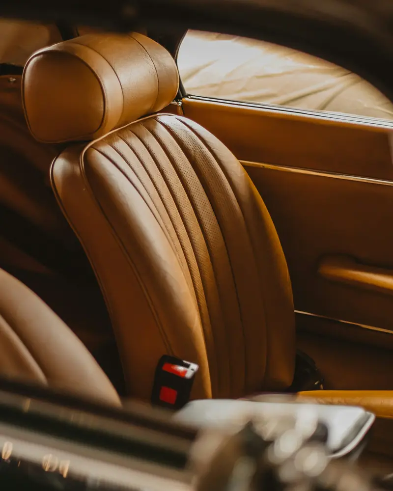 Tan leather seats in a classic car interior