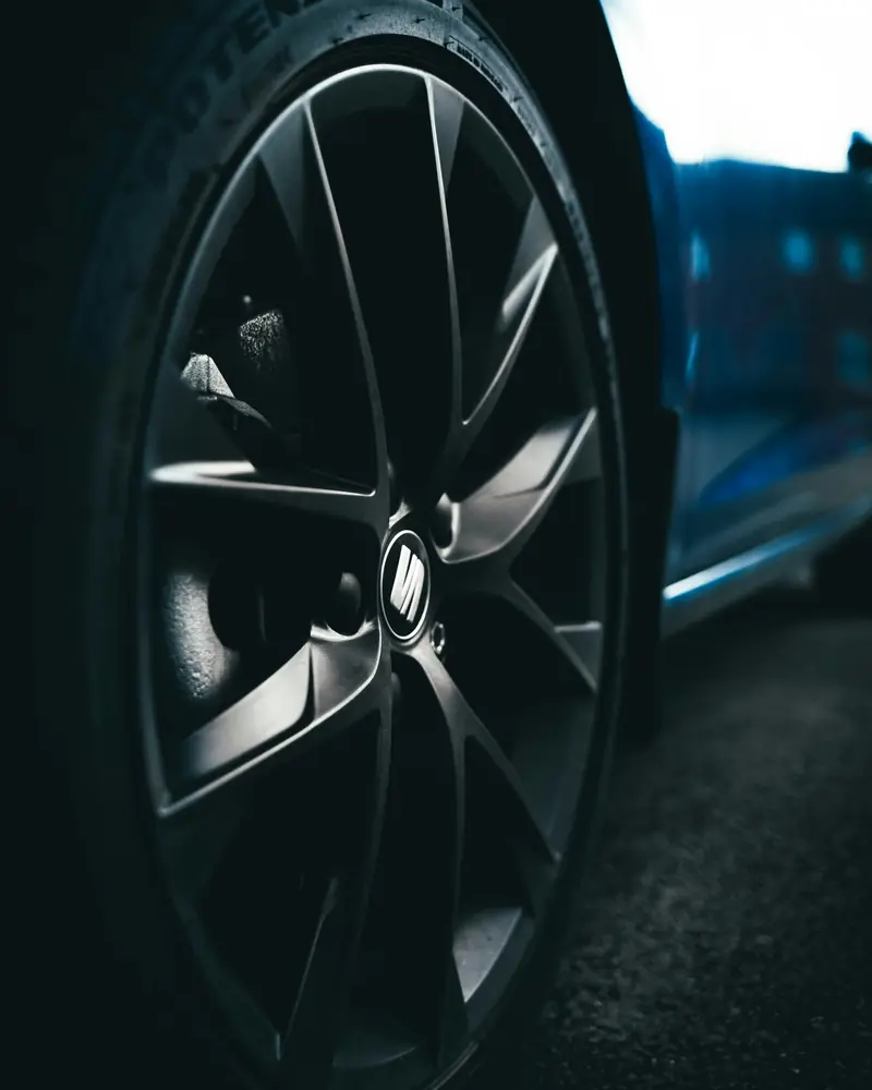 A clean dark alloy wheel and tyre